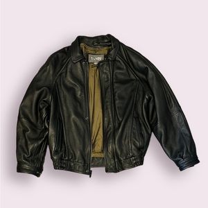 Used. Medium leather jacket